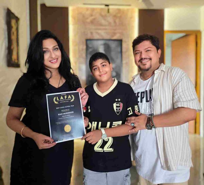 Rian Mukherjee Rian Mukherjee, Rian Mukherjee LAFA 2026, Best Child Actor Award, Los Angeles Film Awards 2026, Manzil Movie, Manzil Hindi Film, Ram Kamal Mukherjee, Rituparna Sengupta, Sanjay Suri, Abhishek Kumar, Dhanbad Talkies, Endeavour Films, Indian Child Actor, Indian Cinema News, International Film Awards, Debut Actor Rian Mukherjee, Manzil Film Cast, Hindi Film News, Jean Vincentelli, Best Child Actor LAFA